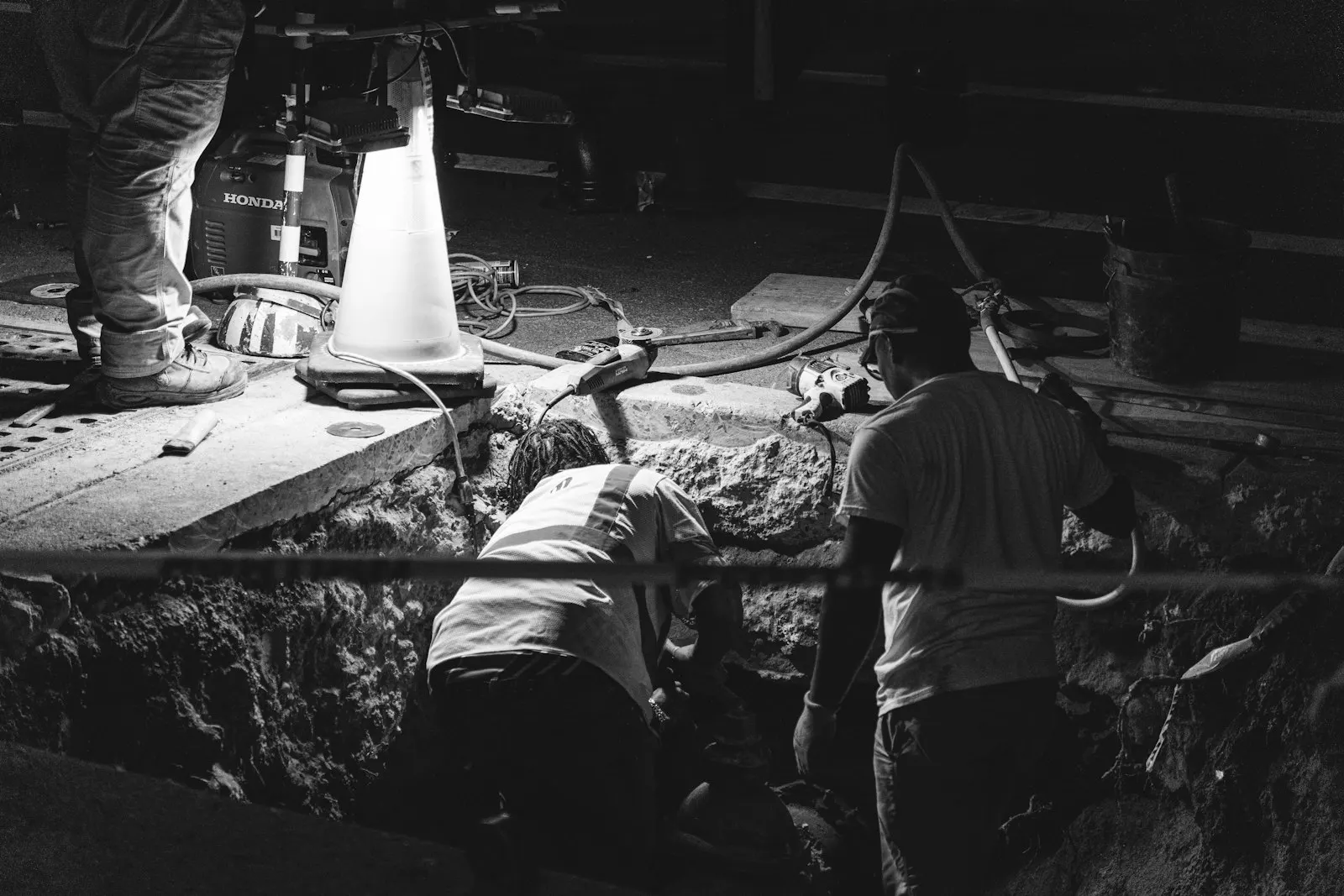 Crew working on a foundation trench